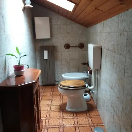 In Mansarda Oda ve Kahvaltı Muzzano